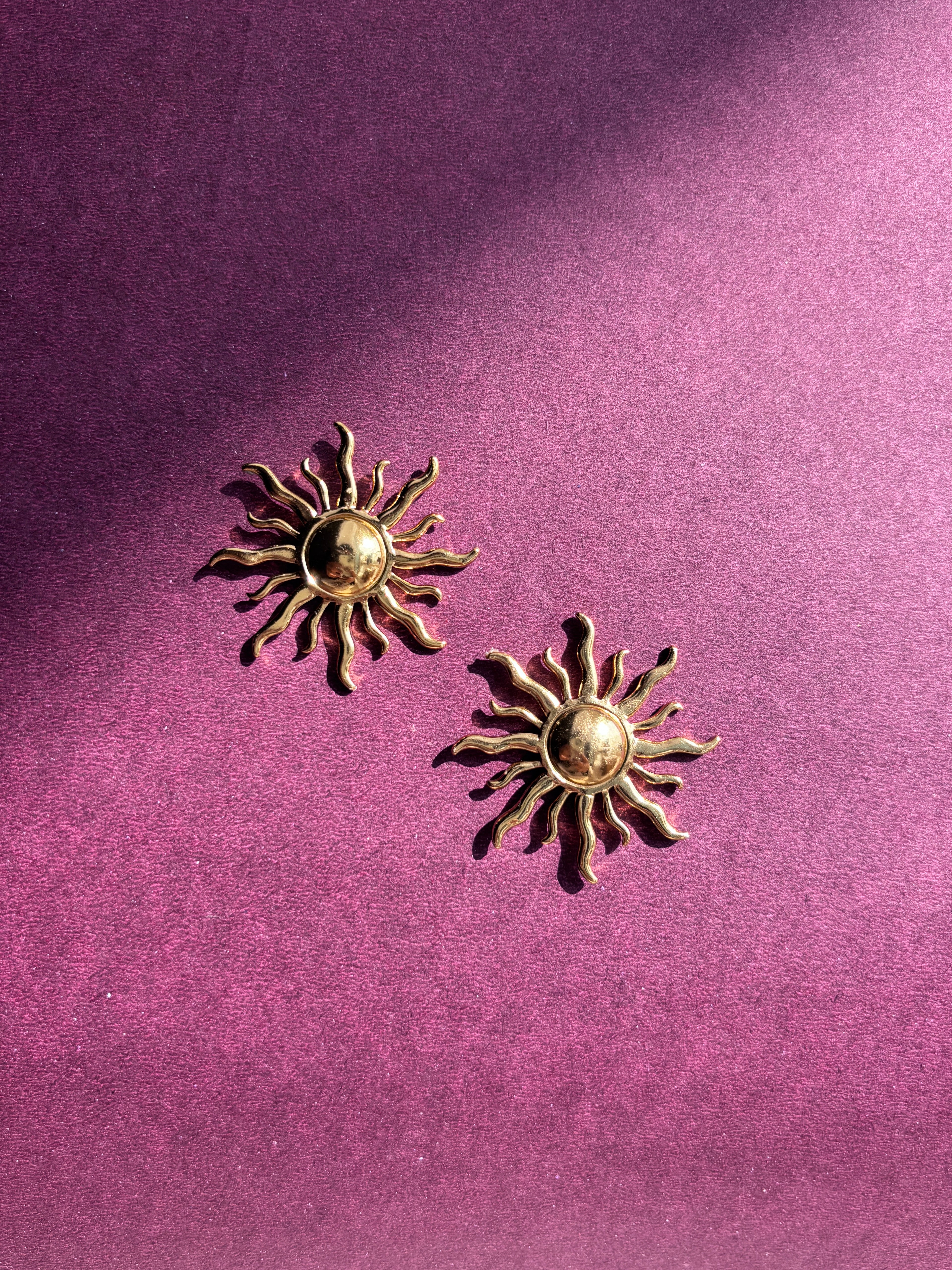 Sun statement earrings